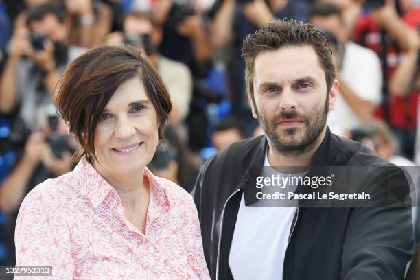 Director Catherine Corsini and Pio Marmai attend the "La Fracture " photocall during the 74th annual Cannes Film Festival on July 10, 2021 in Cannes,...