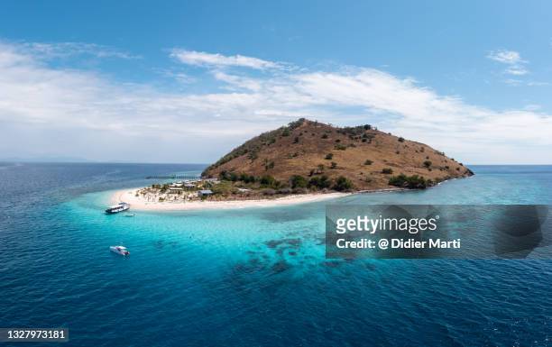 island off labuan bajo in flores, indonesia - flores indonesia stock pictures, royalty-free photos & images