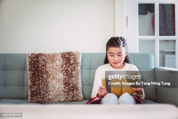 Reading In Computer Kids Reading Computer Books Photos and Premium High Res Pictures ...