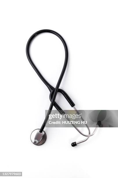 medical stethoscope on white background. health care concept - stethoskop stock-fotos und bilder