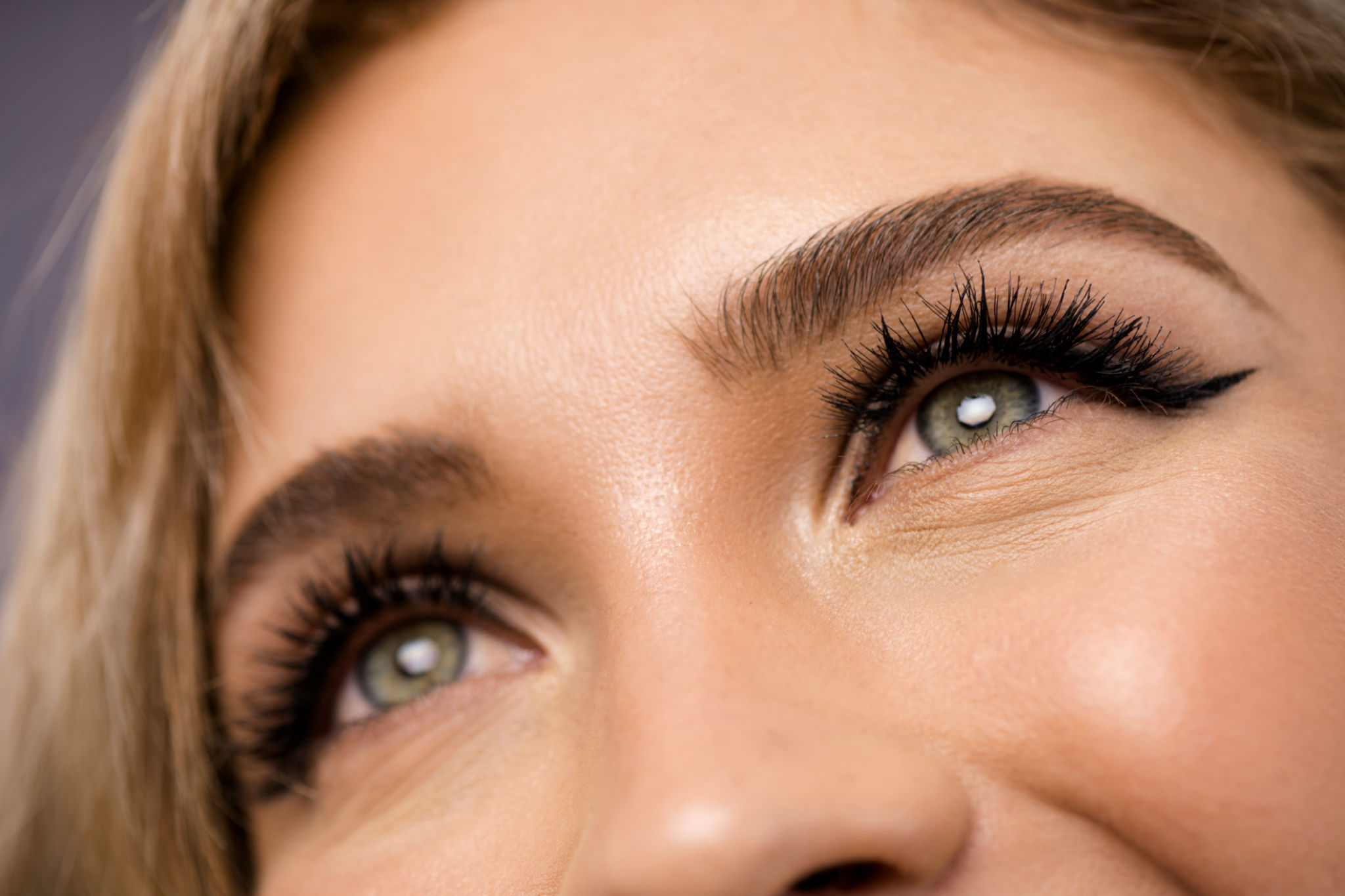 Close-up womans eyes with glam makeup Close-up womans eyes with glam makeup