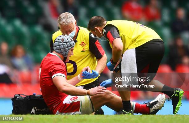 Jonathan Davies of Wales receives medical treatment during the International Friendly match between Wales and Argentina at Principality Stadium on...