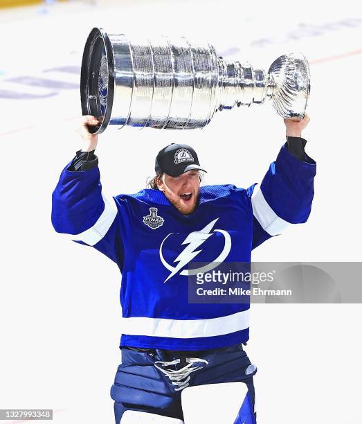 Andrei Vasilevskiy of the Tampa Bay Lightning skates with the Stanley Cup following the team's victory over the Montreal Canadiens in Game Five of...