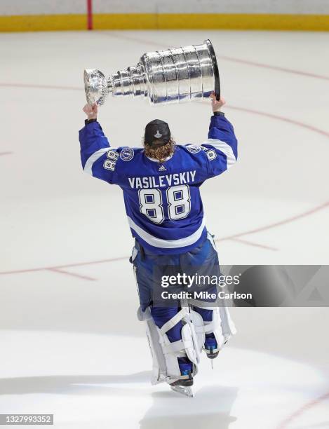 Andrei Vasilevskiy of the Tampa Bay Lightning skates with the Stanley Cup following the team's victory over the Montreal Canadiens in Game Five of...
