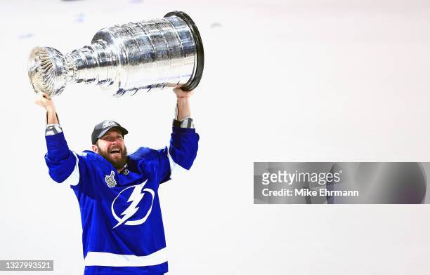 Nikita Kucherov of the Tampa Bay Lightning skates with the Stanley Cup following the team's victory over the Montreal Canadiens in Game Five of the...