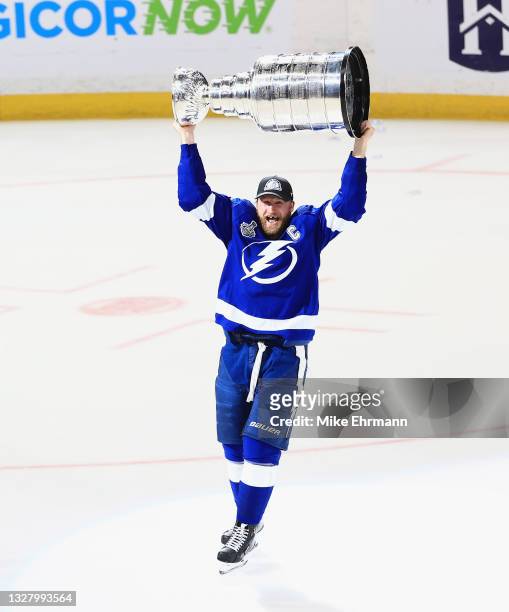 Steven Stamkos of the Tampa Bay Lightning skates with the Stanley Cup following the team's victory over the Montreal Canadiens in Game Five of the...