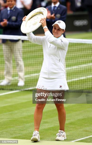 Ashleigh Barty of Australia celebrates with the Venus Rosewater Dish trophy after winning her Ladies' Singles Final match against Karolina Pliskova...