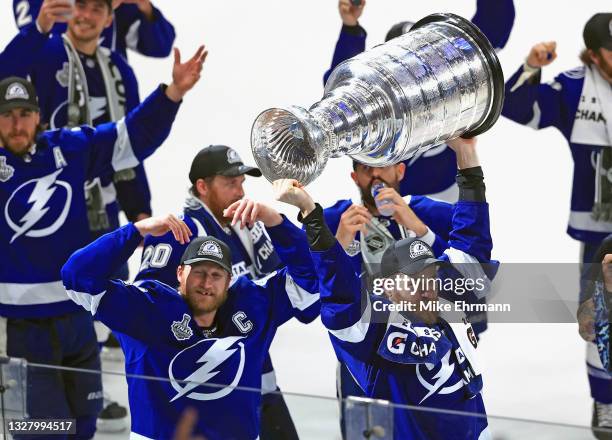 Steven Stamkos and Victor Hedman of the Tampa Bay Lightning skate with the Stanley Cup following the team's victory over the Montreal Canadiens in...