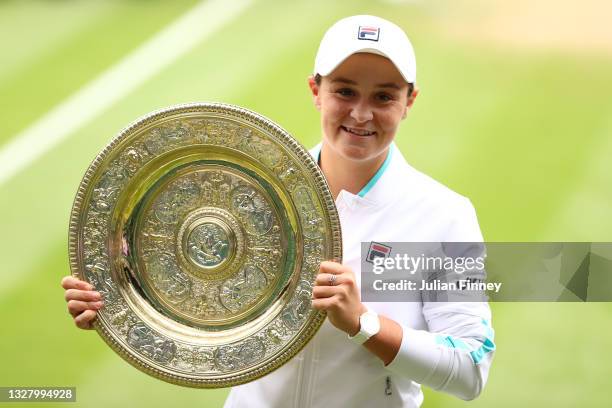 Ashleigh Barty of Australia celebrates with the Venus Rosewater Dish trophy after winning her Ladies' Singles Final match against Karolina Pliskova...