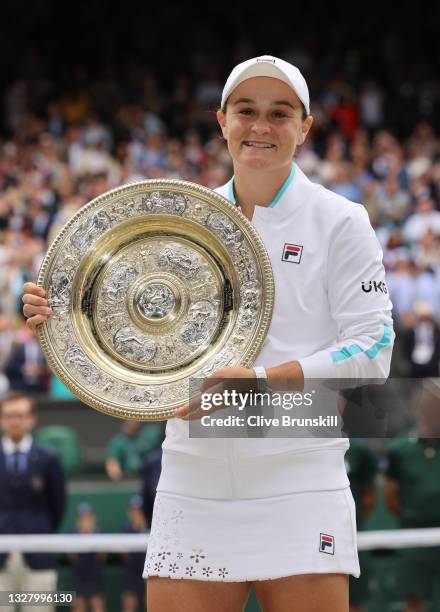 Ashleigh Barty of Australia celebrates with the Venus Rosewater Dish trophy after winning her Ladies' Singles Final match against Karolina Pliskova...