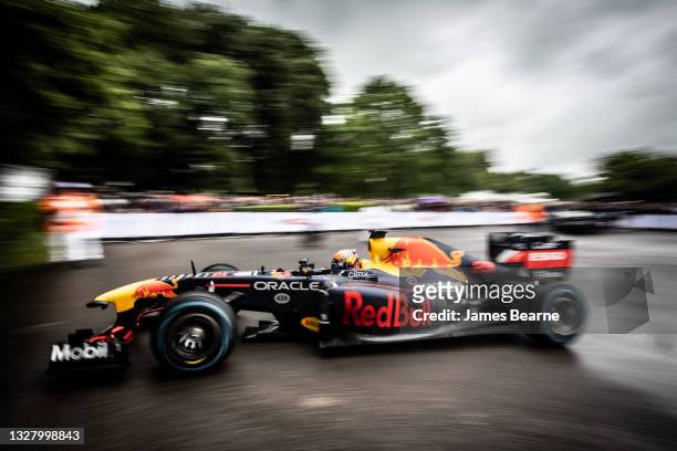 Alex Albon of Thailand and Red Bull Racing drives during the Goodwood Festival of Speed at Goodwood on July 10, 2021 in Chichester, England.