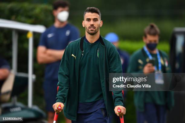 Leonardo Spinazzola of Italy is seen on crutches during the Italy training session ahead of the Euro 2020 Final match between Italy and England at...