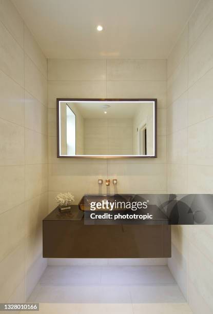 elegant guest's cloakroom - downlight stock pictures, royalty-free photos & images