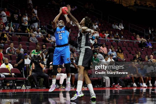Cuttino Mobley of the Power attempts a shot while being guarded by Jordan Hill of the Enemies during BIG3 - Week One at the Orleans Arena on July 10,...