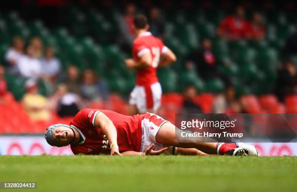 Jonathan Davies of Wales reacts after a tackle from Santiago Chocobares of Argentina during the International Friendly match between Wales and...