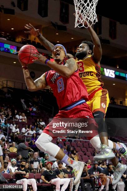 Jamario Moon of the Triplets attempts a shot while being guarded by Will Bynum of the Bivouac during BIG3 - Week One at the Orleans Arena on July 10,...