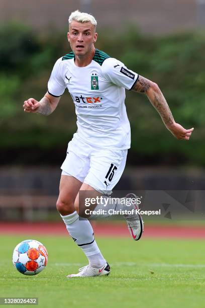 Jordan Beyer of Moenchengladbach runs with the ball during the pre-season Bundesliga match between Borussia Moenchengladbach and Viktoria Koeln at...