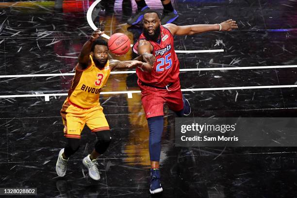 Al Jefferson of the Triplets and Will Bynum of the Bivouac battle for a loose ball during BIG3 - Week One at the Orleans Arena on July 10, 2021 in...