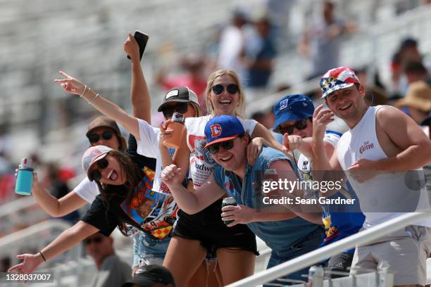 Fans cheer during the NASCAR Xfinity Series Credit Karma Money 250 at Atlanta Motor Speedway on July 10, 2021 in Hampton, Georgia.