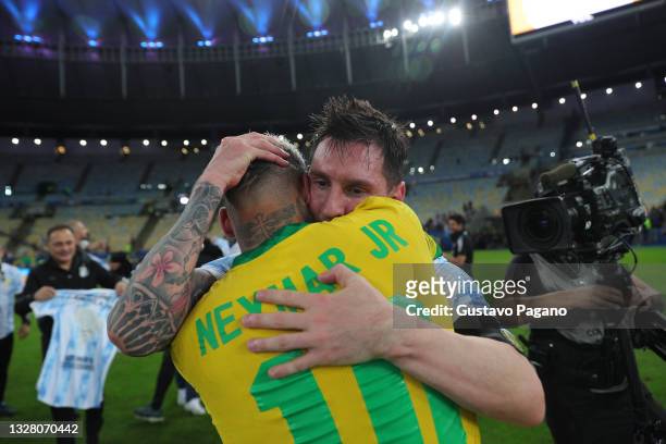Lionel Messi of Argentina hugs Neymar Jr. Of Brazil after the final of Copa America Brazil 2021 between Brazil and Argentina at Maracana Stadium on...