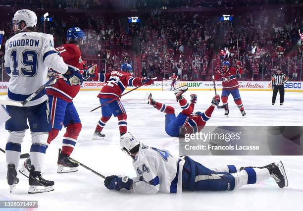 Josh Anderson of the Montreal Canadiens celebrates after scoring the overtime winning goal on goalie Andrei Vasilevskiy of the Tampa Bay Lightning in...