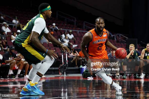 Jeremy Pargo of the 3's Company dribbles the ball while being guarded by Will McDonald of the Ball Hogs during BIG3 - Week One at the Orleans Arena...