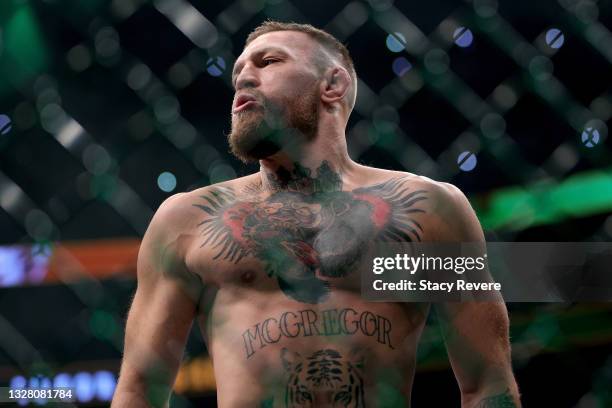 Conor McGregor of Ireland walks in the octagon before his lightweight bought against Dustin Poirier during UFC 264: Poirier v McGregor 3 at T-Mobile...