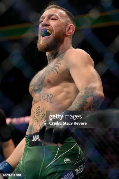 Conor McGregor of Ireland walks in the octagon before his lightweight bought against Dustin Poirier during UFC 264: Poirier v McGregor 3 at T-Mobile...