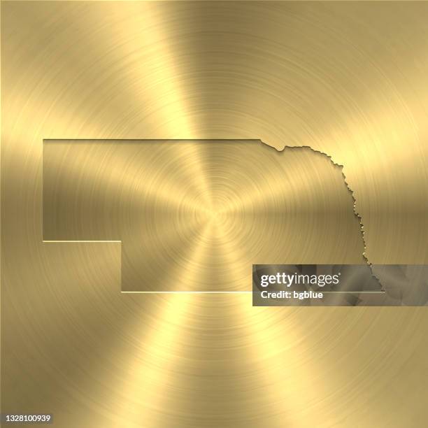 nebraska map on gold background - circular brushed metal texture - omaha outline stock illustrations