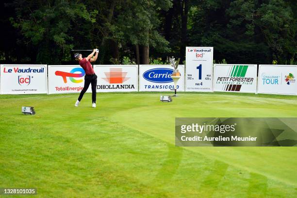 John Axelsen of Denmark pays his first shot on the 1st hole during Day Four of Le Vaudreuil Golf Challenge at Golf PGA France du Vaudreuil on July...
