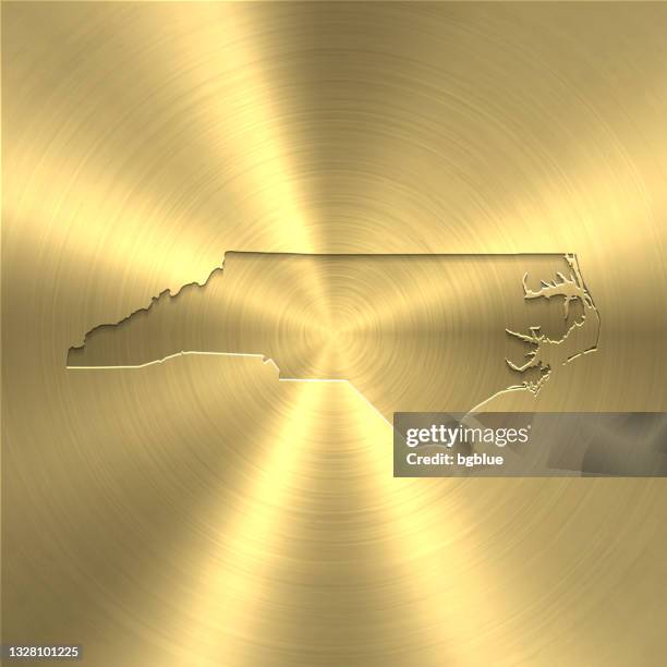 north carolina map on gold background - circular brushed metal texture - copper texture stock illustrations
