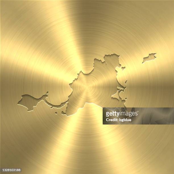 saint-martin map on gold background - circular brushed metal texture - marigot stock illustrations
