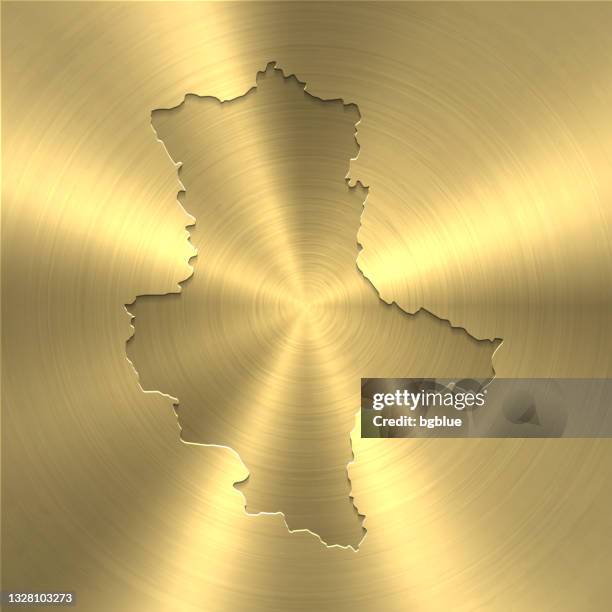 saxony-anhalt map on gold background - circular brushed metal texture - gold border stock illustrations