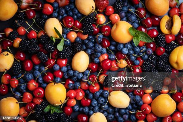 fresh summer berry fruit colorful background - summer fruits stock-fotos und bilder