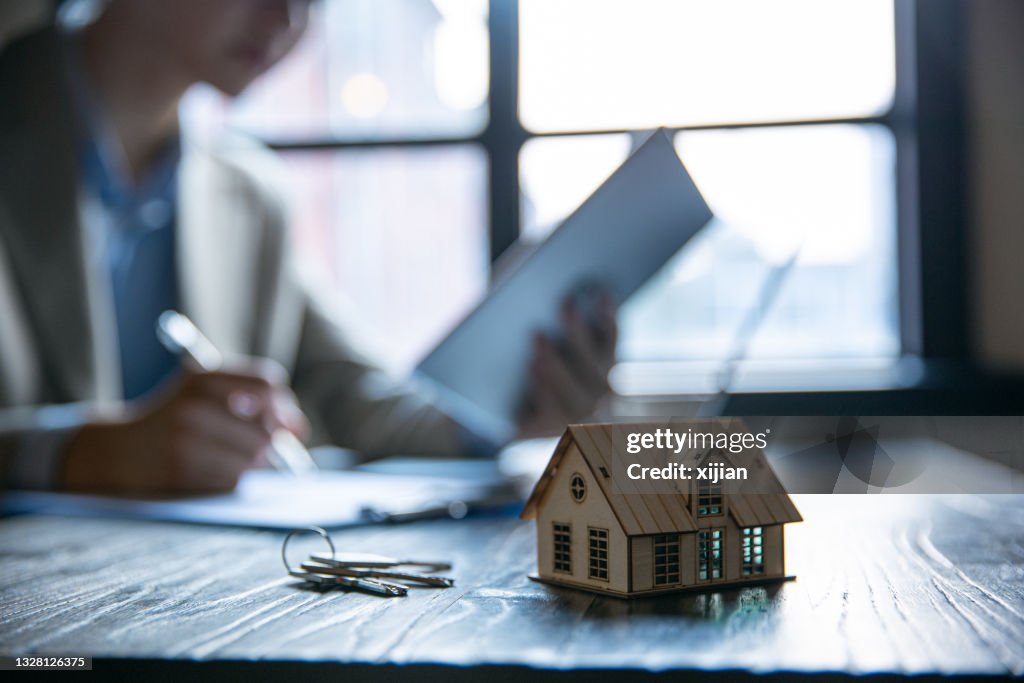 Firmar un acuerdo de venta de casa
