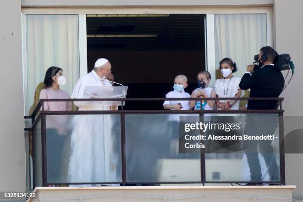 Pope Francis holds his Angelus prayer from the balcony of the Gemelli Hospital, following an three-hour operation on July 4, due to a symptomatic...