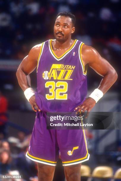 Karl Malone of the Utah Jazz looks on during a NBA basketball game against the Washington Bullets on December 2, 1989 at the Capital Centre in...