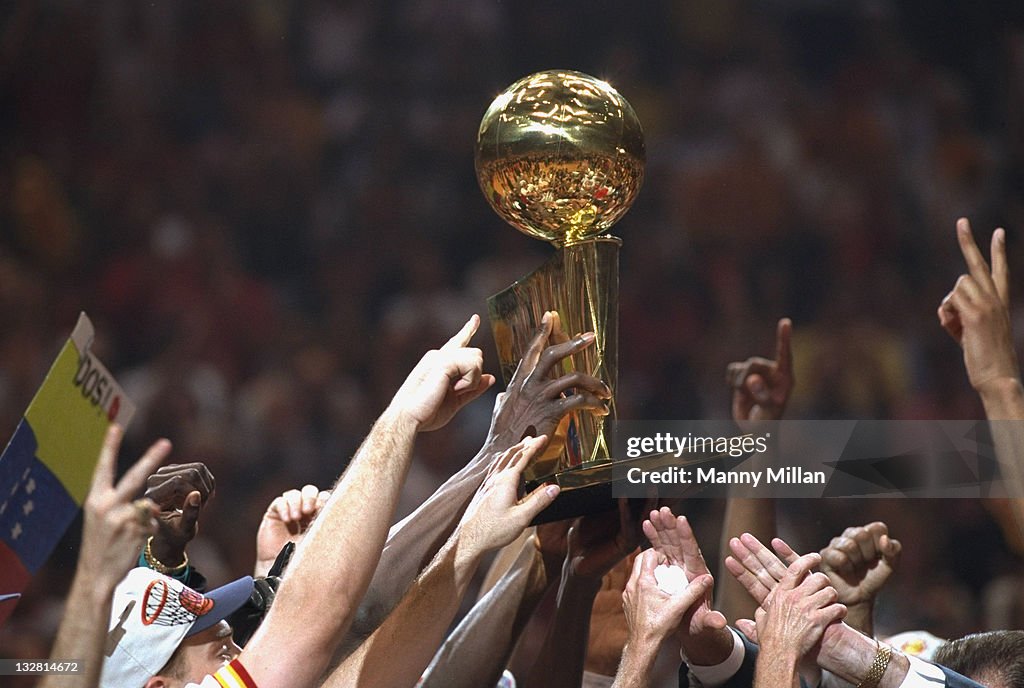 1995 Rockets Final Closeup of Larry O'Brien trophy, Houston Rockets team victorious ...
