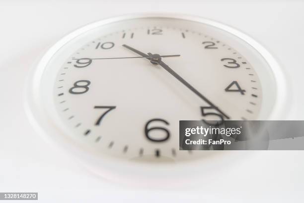 clock hanging on the wall - car crash wall stock pictures, royalty-free photos & images