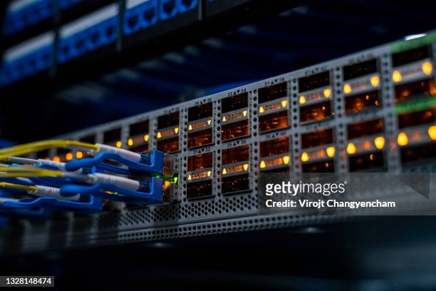 cables in network connection plug at data center room - data centre stock pictures, royalty-free photos & images