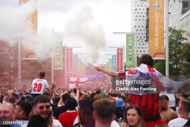 England fans enjoy the pre match atmosphere on Wembley Way prior to the UEFA Euro 2020 Championship Final between Italy and England at Wembley...