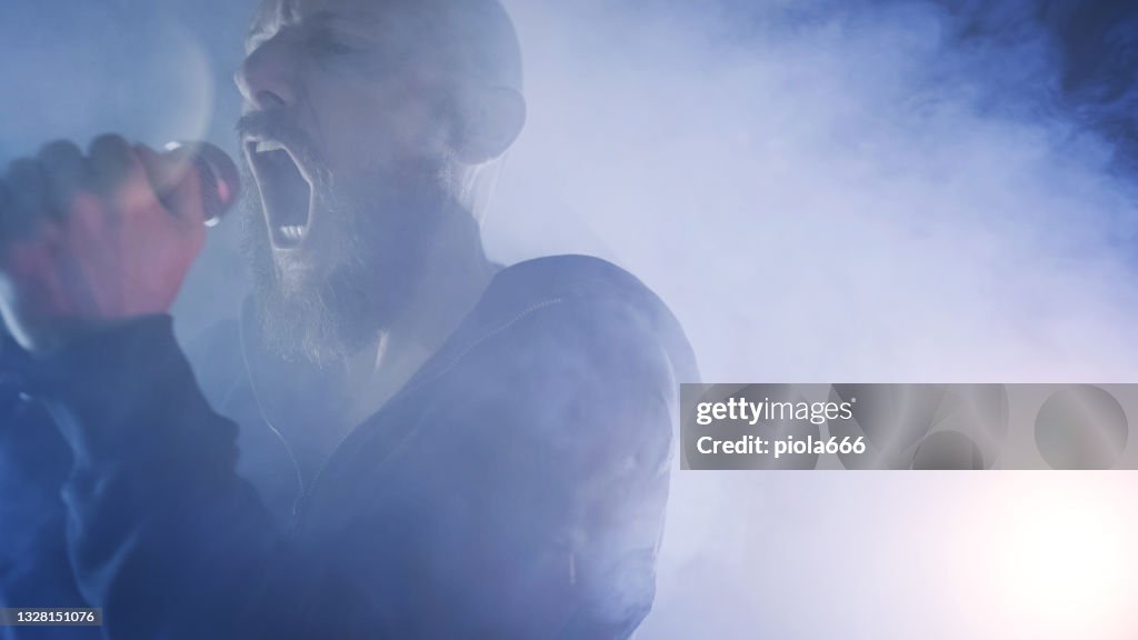 Angry Metal Singer Heavy Metal Rock Singer Screaming In A Live Show With Stage Lights High ...
