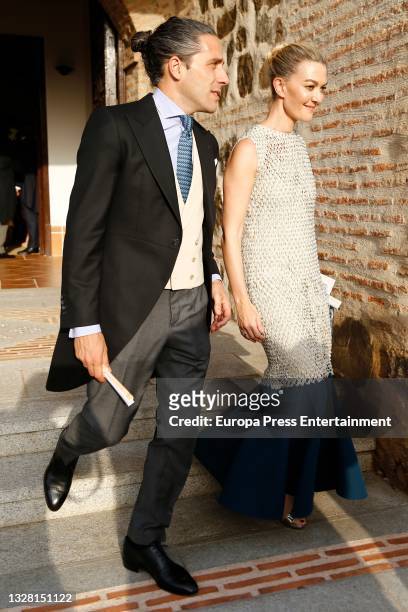 Marta Ortega and Carlos Torreta leaving the wedding of Felipe Cortina and Amelia Millan on July 11, 2021 in Ciudad Real, Spain.