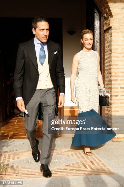 Marta Ortega and Carlos Torreta leaving the wedding of Felipe Cortina and Amelia Millan on July 11, 2021 in Ciudad Real, Spain.