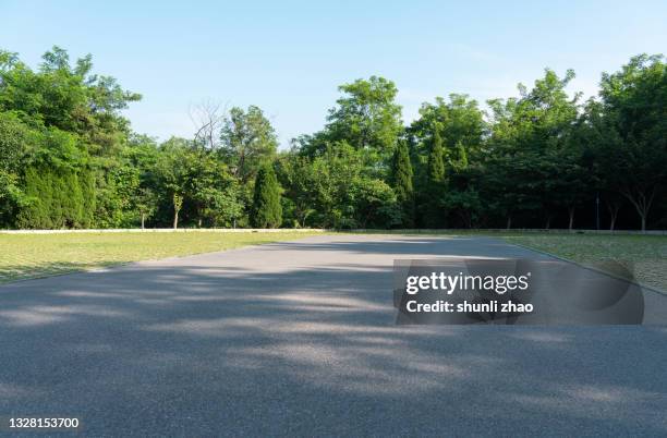 parking lot at the foot of the mountain - natural parkland stock pictures, royalty-free photos & images