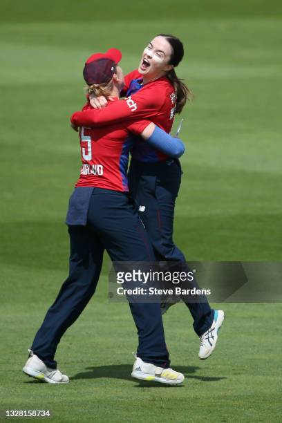Mady Villiers of England celebrates taking the wicket of Shafali Verma of India caught by Nat Sciver with Heather Knight during the Women's Second...