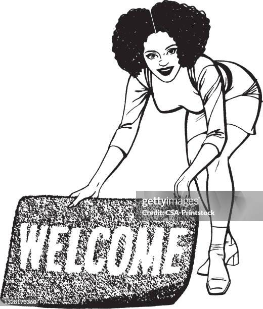 stockillustraties, clipart, cartoons en iconen met woman holding welcome doormat - welkom mat