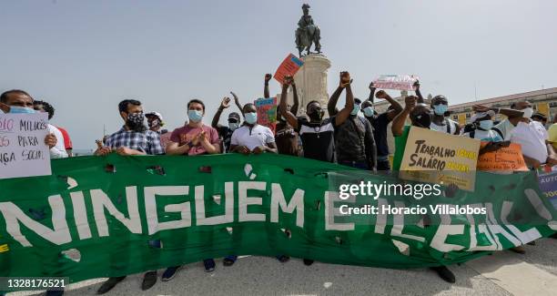 Demonstrators gather in Praça do Comercio to protest against current practices by SEF related to immigrants trying to get their First Residence...