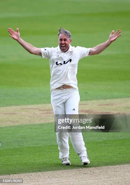 Rikki Clarke of Surrey celebrates dismissing George Bartlett of Somerset during day one of the LV= Insurance County Championship match between Surrey...