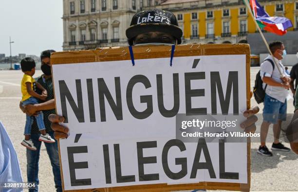 Demonstrators gather in Praça do Comercio to protest against current practices by SEF related to immigrants trying to get their First Residence...